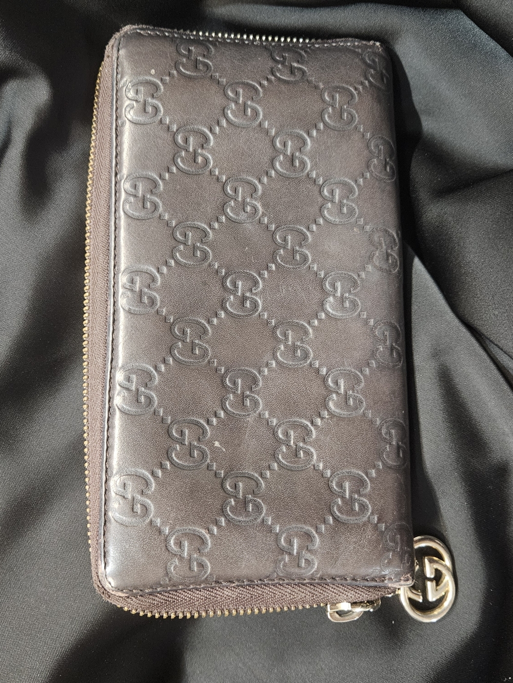 Gucci Brown Embossed GG Zip-Around Wallet with Gold Hardware